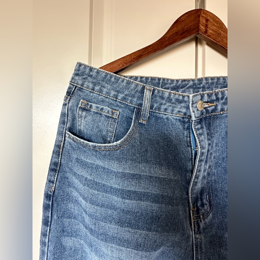 Light Blue Knee Ripped Jeans